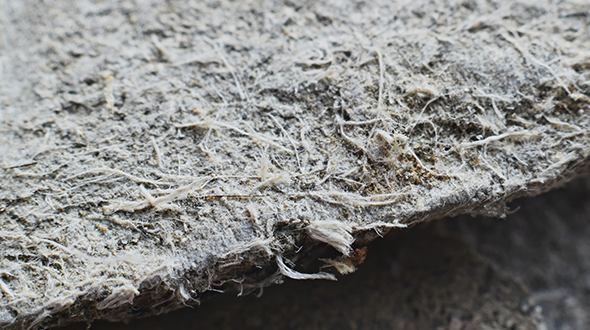 Asbestos materials used in roofing systems