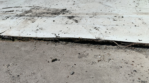 common causes of commercial roof leaks, aging roof membrane seam