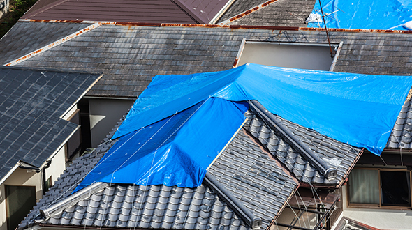 Damaged roof waiting for reroofing or replacement