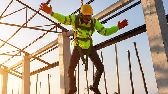Roofing safety includes using a harness to protect workers from falls