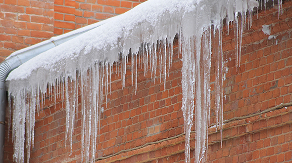 Winter roofing problems include ice buildup
