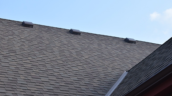 residential roof types of roof ventilation systems, including soffit vents, ridge vents, and a roof-mounted fan