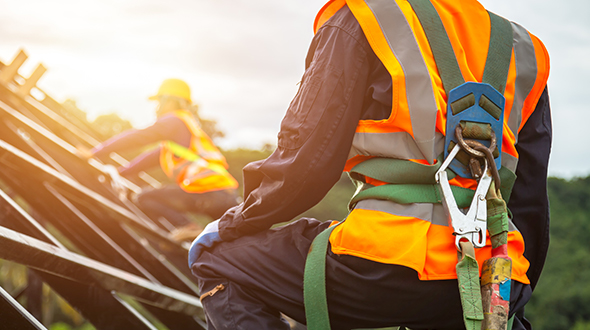 Roofing safety includes using a body harness to prevent falls and injury