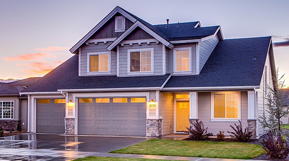 Soffit and fascia along a home with gutters and curb appeal